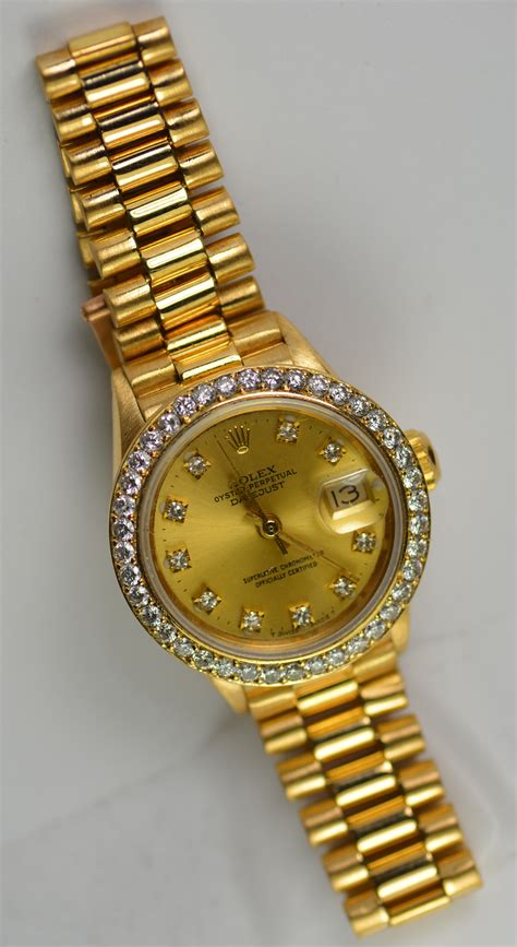 rolex womens watch solid gold and diamond|gold rolex with diamond bezel.